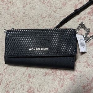 Michael Kors clutch — never used